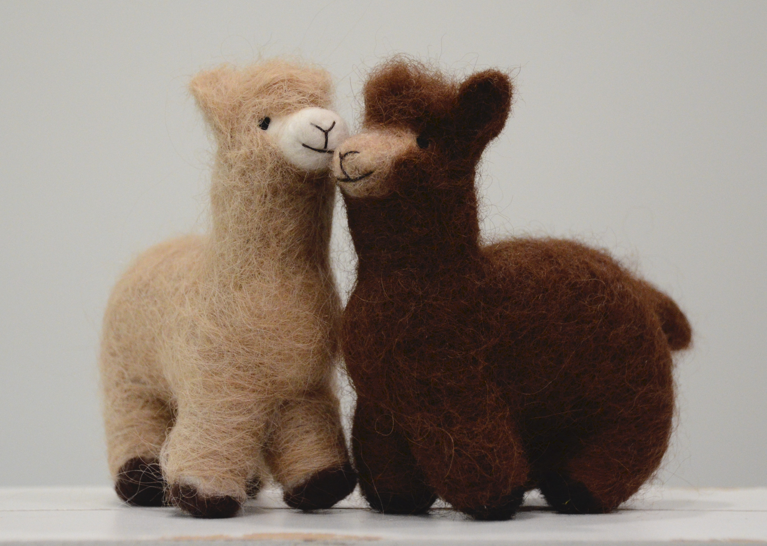 Photo of needle felted alpacas